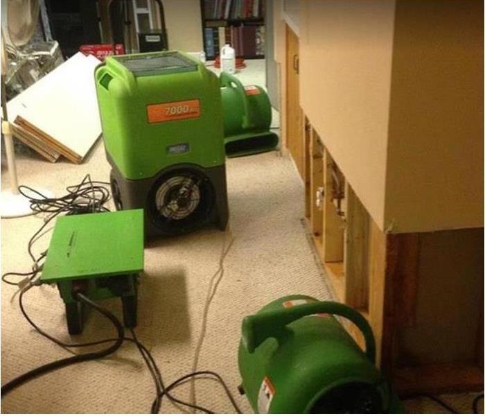 SERVPRO drying equipment being used in water damaged room